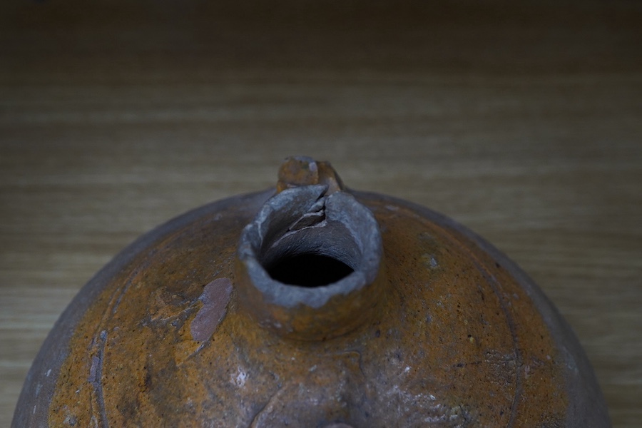 A Verwood pottery owl costrel, with twin handles, 21cm high. Condition - cracked